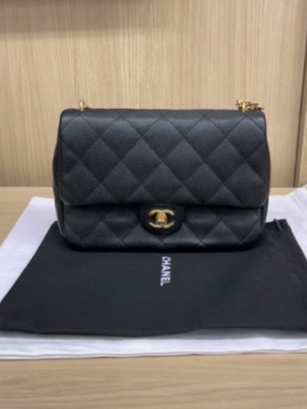 CHANEL Black Quilted Shoulder Bag with Gold Hardware